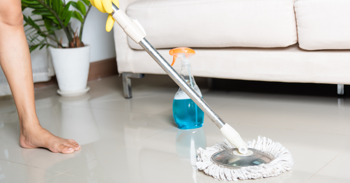 asian-woman-washes-floor-with-mop-rag-indoors-housewife-washing-floor-mopping-home