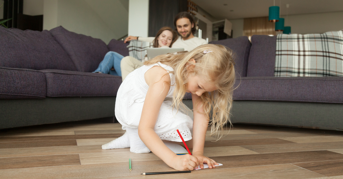 cute-girl-daughter-drawing-with-colored-pencils-playing-home