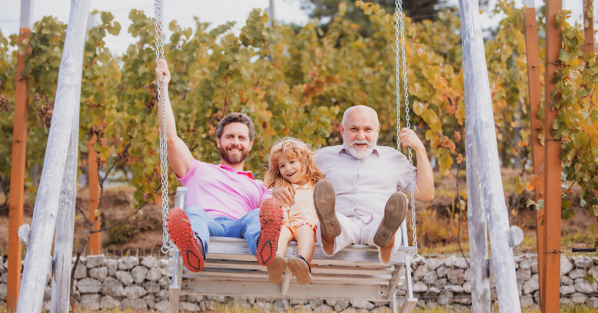 men-generation-family-playing-swing-together-excited-grandfather-amazed-father-funny-son-swin